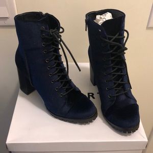 Report Alanna Laced up boots.